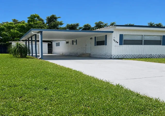 Photo 3 of Manufactured home for sale at 7134 Lofty Dr, Port Richey, FL 34668 | MLS# W7889047 | Listing updated on 2026-09-02