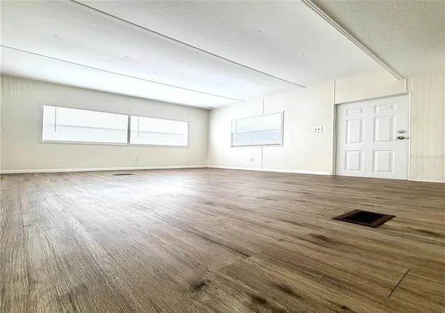 Photo 3 of Manufactured home for sale at 7134 Lofty Dr, Port Richey, FL 34668 | MLS# W7889047 | Listing updated on 2026-10-02
