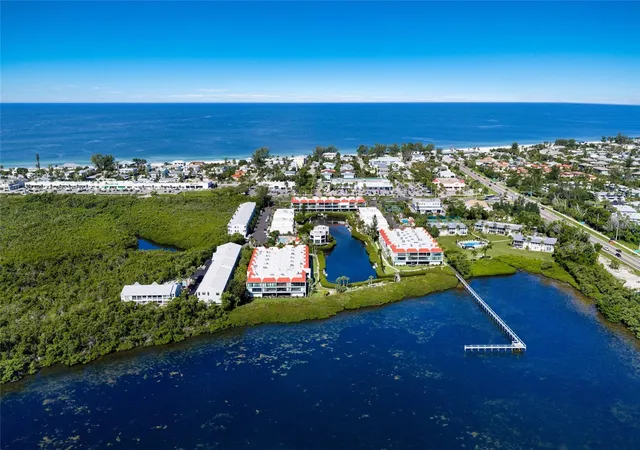 Photo 1 of Condo for sale at 3705 E Bay Dr #115, Holmes Beach, FL 34217 | MLS# A4704522 | Listing updated on 2026-09-17