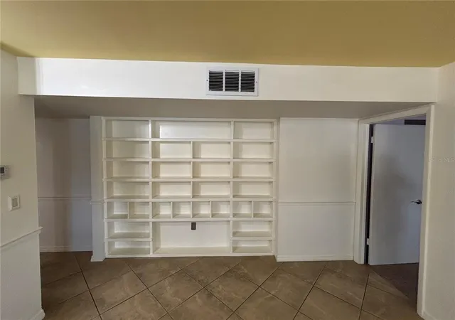Listing Photo 5 - Condo for sale in building located at 770 N Vlg Lake Ter, Saint Petersburg, FL 33716 - Unit #203