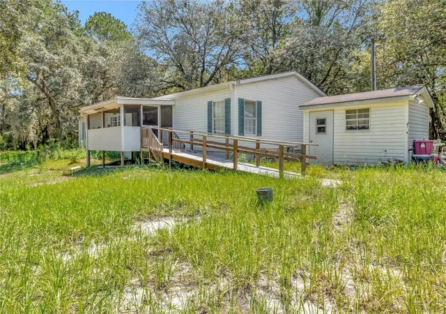 Photo 1 of Manufactured home for sale at 110 Hollister School Rd, Palatka, FL 32177 | MLS# OM731388 | Listing updated on 2026-09-01