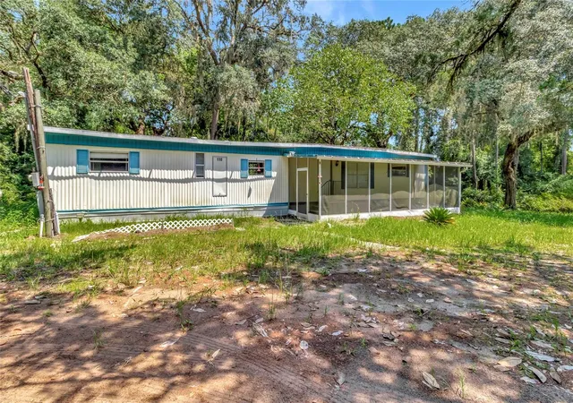 Photo 2 of Manufactured home for sale at 110 Hollister School Rd, Palatka, FL 32177 | MLS# OM731388 | Listing updated on 2026-09-01