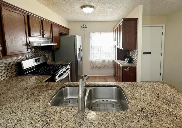 Photo 4 of Condo for sale at 1279 Mission Hills Blvd, Clearwater, FL 33759 | MLS# TB8544061 | Listing updated on 2026-09-04