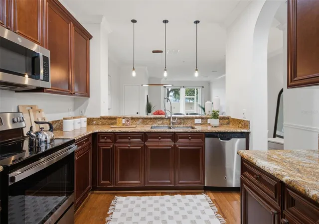 Photo 3 of Townhouse for sale at 5957 Strada Capri Way, Orlando, FL 32835 | MLS# O6437894 | Listing updated on 2026-09-05