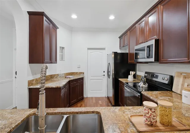 Photo 4 of Townhouse for sale at 5957 Strada Capri Way, Orlando, FL 32835 | MLS# O6437894 | Listing updated on 2026-09-05