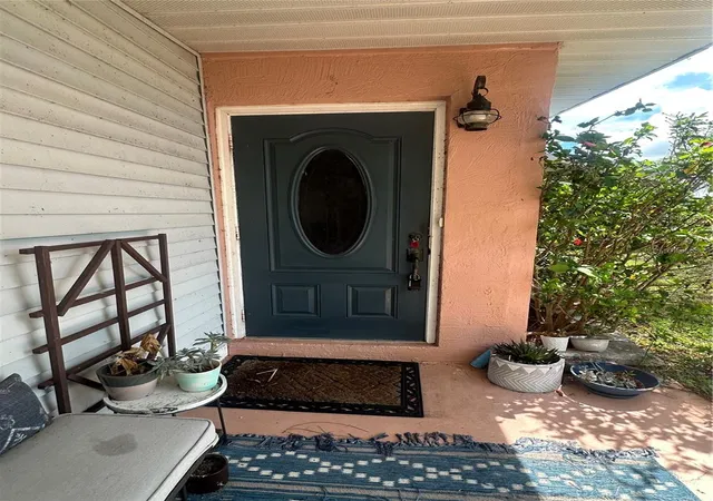 Photo 2 of Single family home for sale at 21050 Ionia Ave, Port Charlotte, FL 33952 | MLS# C7530186 | Listing updated on 2026-09-02