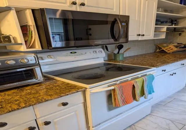 Photo 2 of Single family home for sale at 21050 Ionia Ave, Port Charlotte, FL 33952 | MLS# C7530186 | Listing updated on 2026-09-02