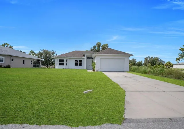 Photo 1 of Single family home for sale at 856 William Denver St, Lehigh Acres, FL 33974 | MLS# A4704653 | Listing updated on 2026-09-03