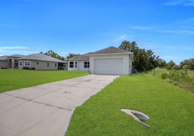 Photo 2 of Single family home for sale at 856 William Denver St, Lehigh Acres, FL 33974 | MLS# A4704653 | Listing updated on 2026-09-03