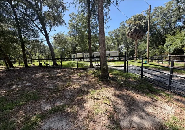 Photo 2 of Manufactured home for sale at 10685 SW 156th Place, Dunnellon, FL 34432 | MLS# O6438013 | Listing updated on 2026-09-02