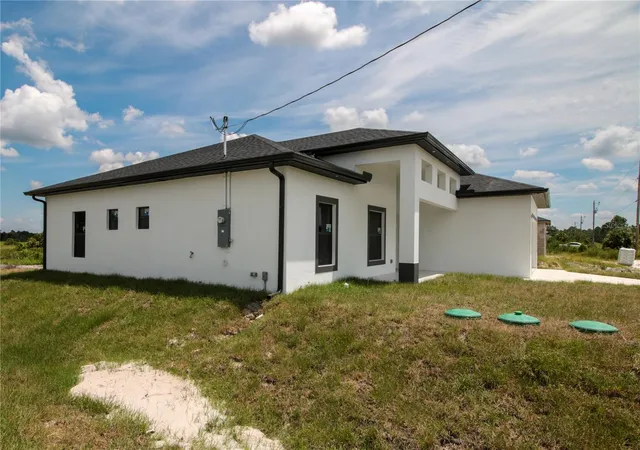 Photo 3 of Single family home for sale at 945 Commodore St, Lehigh Acres, FL 33974 | MLS# O6438060 | Listing updated on 2026-09-08