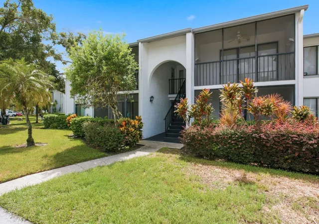 Photo 1 of Condo for sale at 1345 Pine Ridge Cir E #A2, Tarpon Springs, FL 34688 | MLS# TB8544452 | Listing updated on 2026-09-03