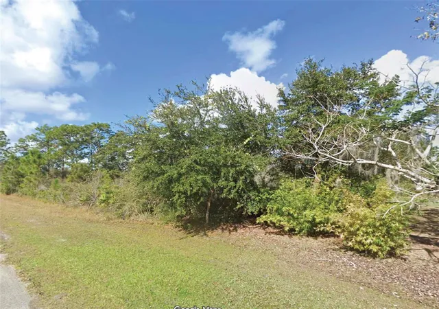 Photo 1 of Land for sale at 10 Camellia Dr, Indian Lake Estates, FL 33855 | MLS# O6438264 | Listing updated on 2026-09-02