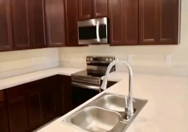 Photo 3 of Townhouse for sale at 4812 Coral Castle Dr, Kissimmee, FL 34746 | MLS# W7889115 | Listing updated on 2026-09-03