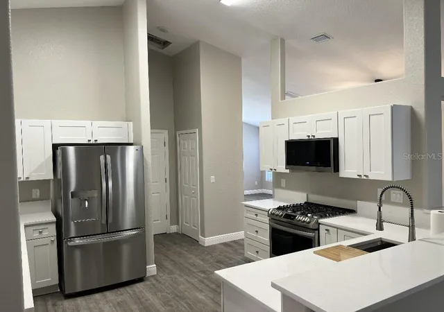 Photo 2 of Single family home for sale at 735 Hurley Dr, Winter Garden, FL 34787 | MLS# TB8544631 | Listing updated on 2026-09-03