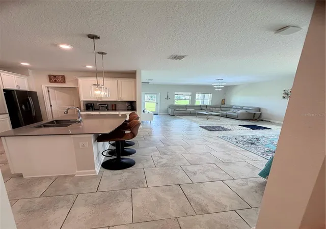 Photo 3 of Single family home for sale at 4310 Seven Canyons Dr, Kissimmee, FL 34746 | MLS# O6438327 | Listing updated on 2026-09-07