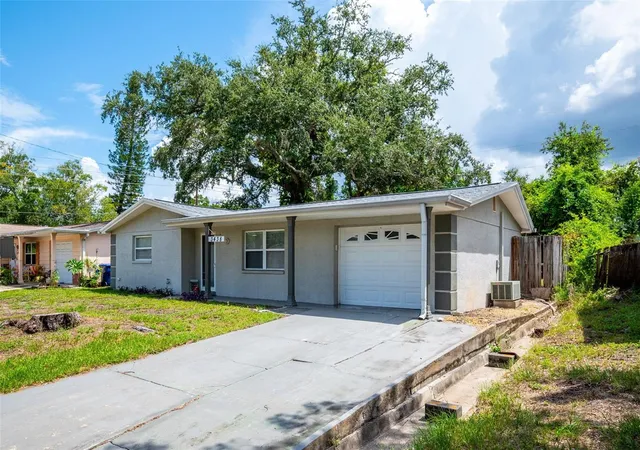 Photo 1 of Single family home for sale at 3438 Kimberly Oaks Dr, Holiday, FL 34691 | MLS# TB8544774 | Listing updated on 2026-09-07
