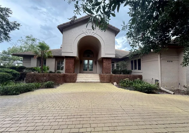 Photo 1 of Single family home for sale at 5379 Isleworth Country Clb Dr, Windermere, FL 34786 | MLS# O6438449 | Listing updated on 2026-09-06