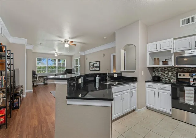 Photo 3 of Condo for sale at 6663 Queens Borough Ave #104, Orlando, FL 32835 | MLS# S5156806 | Listing updated on 2026-09-03
