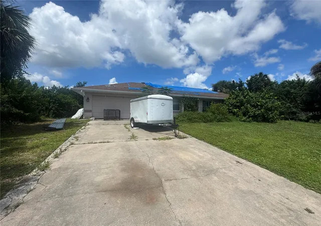 Photo 1 of Single family home for sale at 168 Millport St Nw, Port Charlotte, FL 33948 | MLS# C7530290 | Listing updated on 2026-09-03