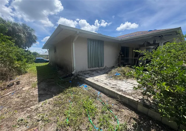 Photo 2 of Single family home for sale at 168 Millport St NW, Port Charlotte, FL 33948 | MLS# C7530290 | Listing updated on 2026-09-03