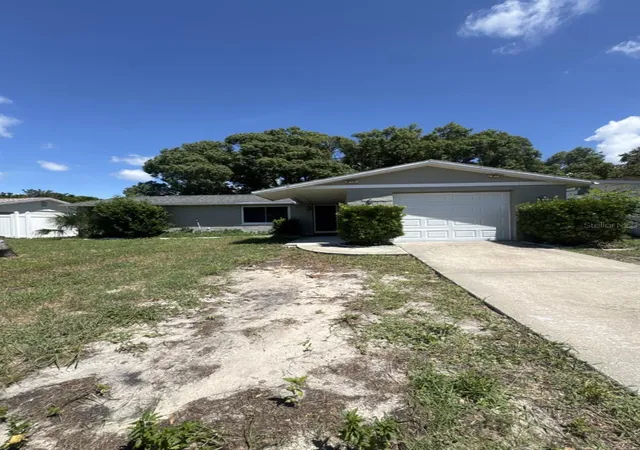 Photo 1 of Single family home for sale at 8930 Windsong Ln, Port Richey, FL 34668 | MLS# O6438756 | Listing updated on 2026-09-23
