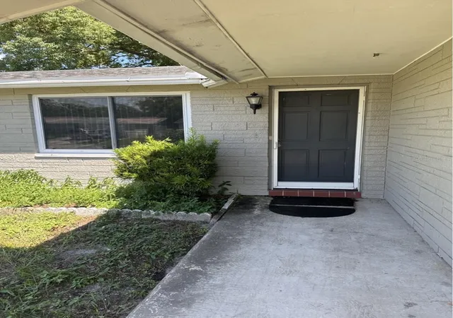 Photo 2 of Single family home for sale at 8930 Windsong Ln, Port Richey, FL 34668 | MLS# O6438756 | Listing updated on 2026-09-23