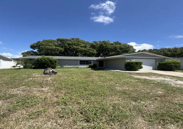 Photo 3 of Single family home for sale at 8930 Windsong Ln, Port Richey, FL 34668 | MLS# O6438756 | Listing updated on 2026-09-23