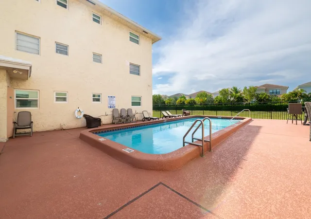 Photo 2 of Condo for sale at 8821 Nw 38th Dr #205a, Coral Springs, FL 33065 | MLS# F10505914 | Listing updated on 2026-10-06