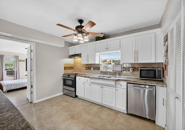 Photo 3 of Single family home for sale at 1136 W 7th St, Riviera Beach, FL 33404 | MLS# R11114597 | Listing updated on 2026-09-14