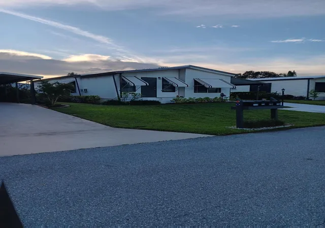 Photo 2 of Manufactured home for sale at 7781 Se Shenandoah Dr, Hobe Sound, FL 33455 | MLS# R11126247 | Listing updated on 2026-09-23