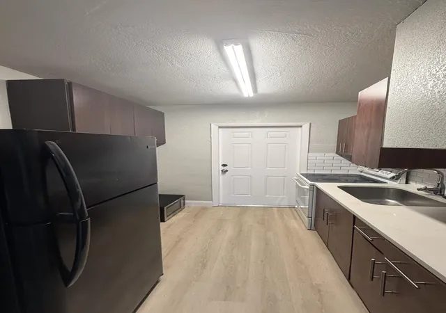Photo 2 of Multi family home for sale at 911 Nw 12th Avenue #1-2, Fort Lauderdale, FL 33311 | MLS# F10541505 | Listing updated on 2026-09-15