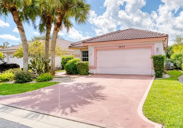 Photo 1 of Single family home for sale at 2824 Waters Edge Cir, Greenacres, FL 33413 | MLS# F10545520 | Listing updated on 2026-09-14