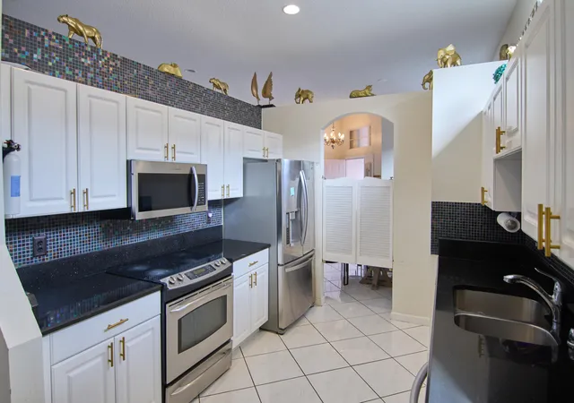 Photo 3 of Single family home for sale at 2824 Waters Edge Cir, Greenacres, FL 33413 | MLS# F10545520 | Listing updated on 2026-09-14