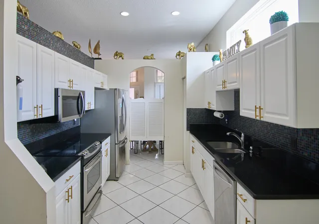 Photo 3 of Single family home for sale at 2824 Waters Edge Cir, Greenacres, FL 33413 | MLS# F10545520 | Listing updated on 2026-09-14