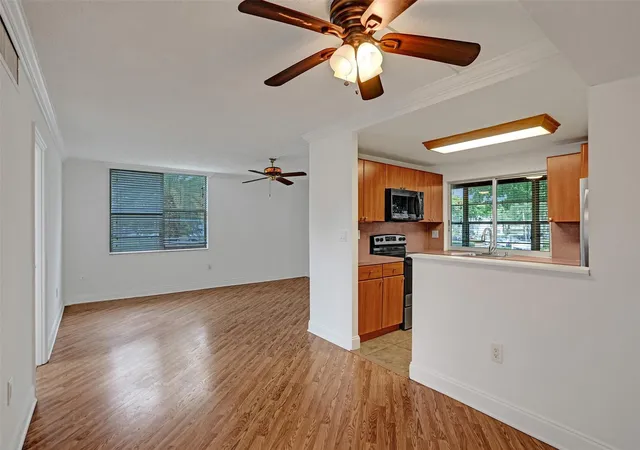 Listing Photo 2 - Condo for sale in building located at 9351 Lime Bay Blvd, Tamarac, FL 33321 - Unit #201