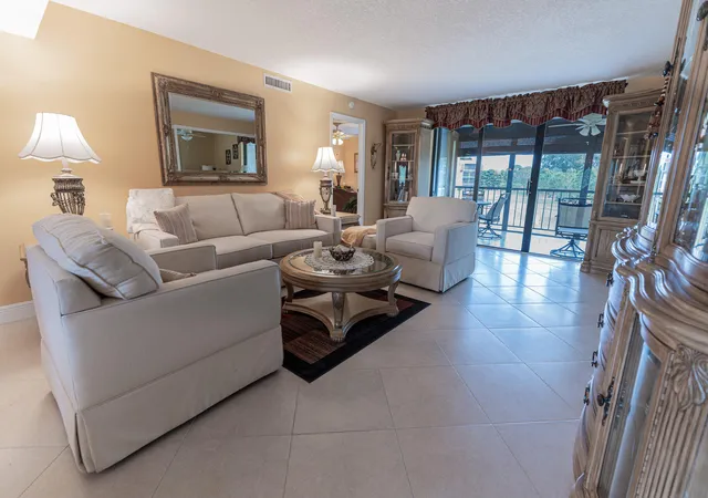 Photo 1 of Condo for sale at 5390 Woodland Lakes Dr #201, Palm Beach Gardens, FL 33418 | MLS# R11161896 | Listing updated on 2026-09-14