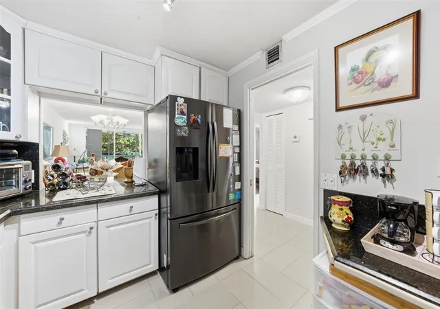 Photo 3 of Condo for sale at 3000 S Course Dr #201, Pompano Beach, FL 33069 | MLS# F10549608 | Listing updated on 2026-09-15