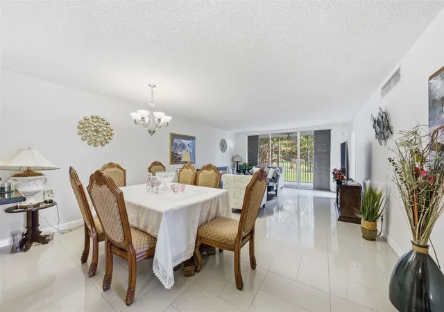 Photo 3 of Condo for sale at 3000 S Course Dr #201, Pompano Beach, FL 33069 | MLS# F10549608 | Listing updated on 2026-09-15