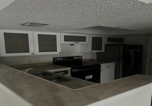 Photo 3 of Condo for sale at 5031 Wiles Rd #202, Coconut Creek, FL 33073 | MLS# F10555393 | Listing updated on 2026-09-25