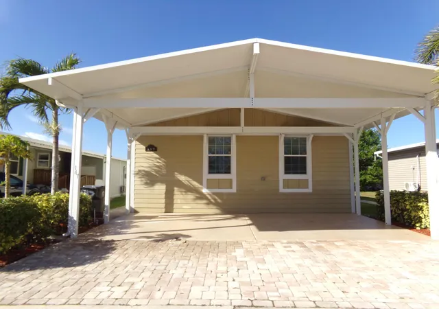 Photo 2 of Manufactured home for sale at 147 Plantation Blvd, Lake Worth, FL 33467 | MLS# B26000660 | Listing updated on 2026-10-04