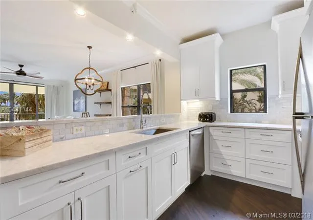Photo 1 of Condo for sale at 100 Uno Lago Dr #205, Juno Beach, FL 33408 | MLS# B26003776 | Listing updated on 2026-09-23