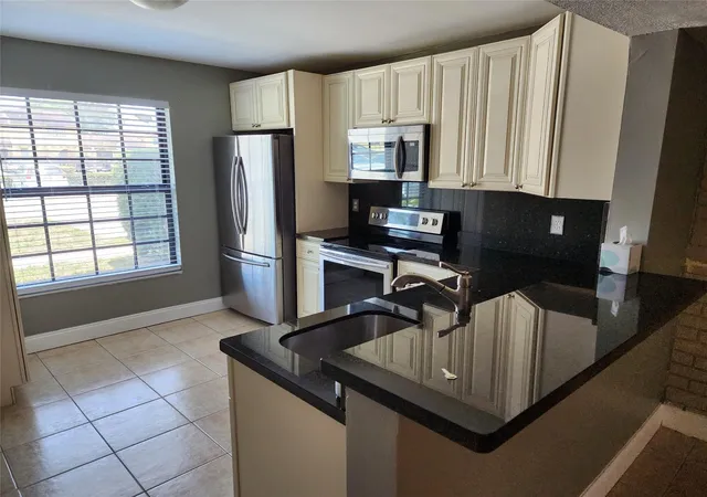 Listing Photo 4 - Condo for sale in building located at 2619 NW 47th Ln, Lauderdale Lakes, FL 33313