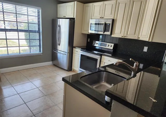 Listing Photo 5 - Condo for sale in building located at 2619 NW 47th Ln, Lauderdale Lakes, FL 33313