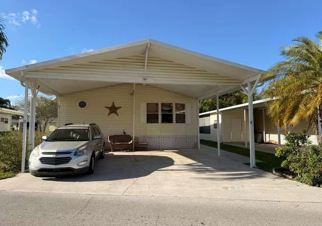Photo 1 of Manufactured home for sale at 2 S 4 Seasons Rd, West Palm Beach, FL 33410 | MLS# B26013375 | Listing updated on 2026-09-16