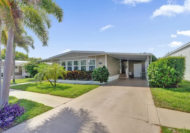 Photo 1 of Manufactured home for sale at 120 Nw 53rd Place, Deerfield Beach, FL 33064 | MLS# B26018991 | Listing updated on 2026-09-13
