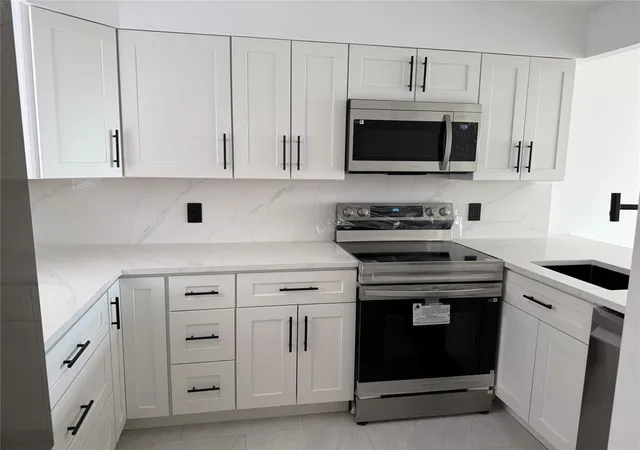 Photo 1 of Condo for sale at 112 Royal Park Dr #4b, Oakland Park, FL 33309 | MLS# B26024010 | Listing updated on 2026-09-28