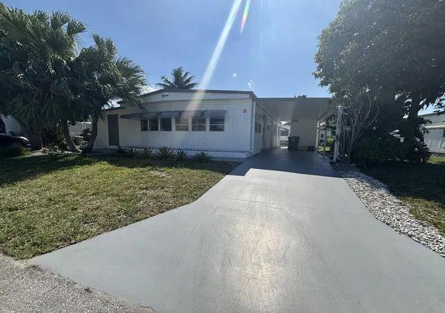 Photo 2 of Manufactured home for sale at 6445 Cypress Ln #377, Lake Worth, FL 33462 | MLS# B26024148 | Listing updated on 2026-09-15