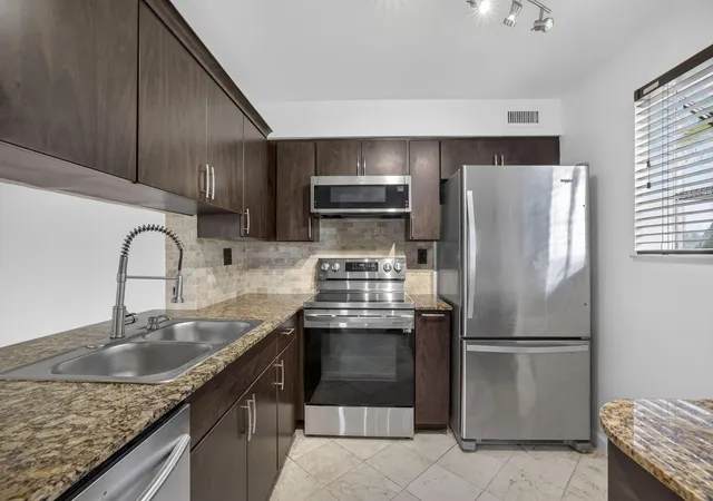Photo 3 of Condo for sale at 3041 N Oakland Forest Dr #103, Oakland Park, FL 33309 | MLS# B26025083 | Listing updated on 2026-09-29