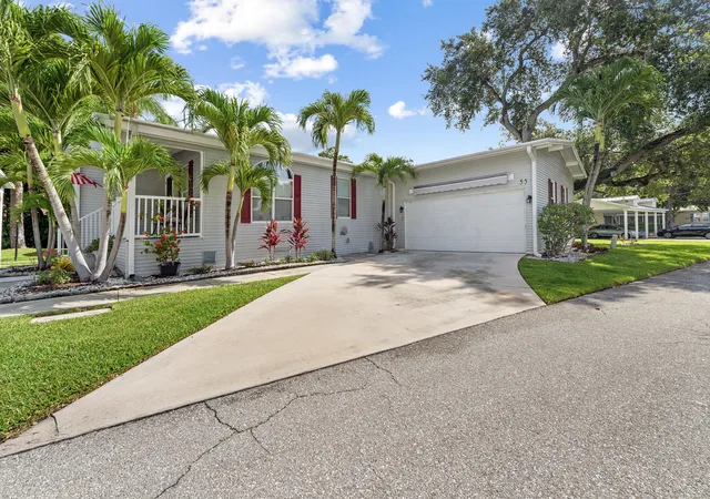 Photo 1 of Manufactured home for sale at 2555 Pga Blvd #55, Palm Beach Gardens, FL 33410 | MLS# B26025249 | Listing updated on 2026-10-05